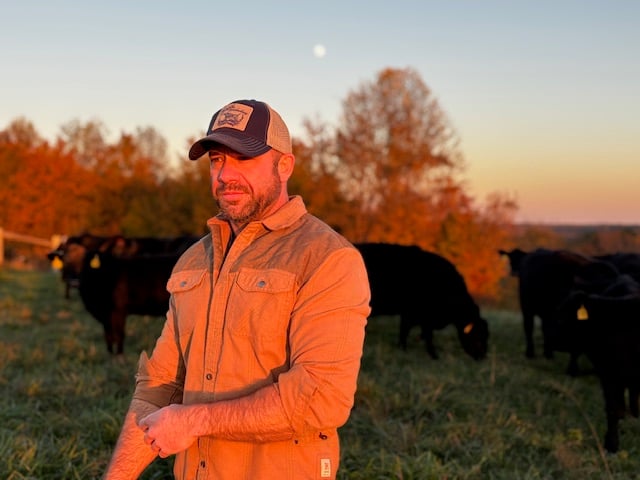 Nathan D. Williams with cows